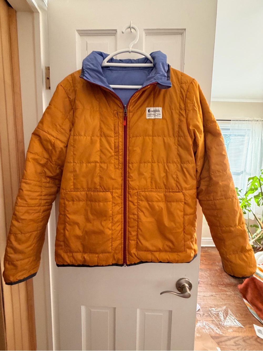 cotopaxi Golden Yellow Puffer Jacket with Blue and Orange Lining